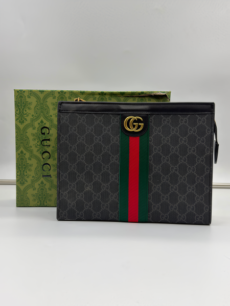 شنط يد رجالي (كلاتش)