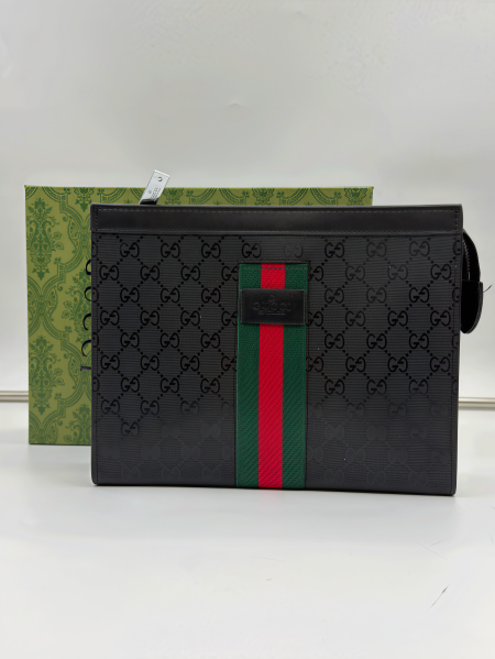 شنط يد رجالي (كلاتش)